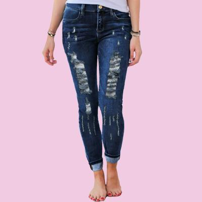 China Wholesale Womens Blue Breathable Denim Pants Mid Rise Distressed Skinny Ripped Holes Jeans Pants For Ladies for sale