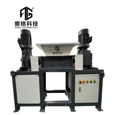 China Hotels Small Double Shaft Shredding For Glass And Bottle Solid Agriculture Waste Cable Car Shredder Machine for sale