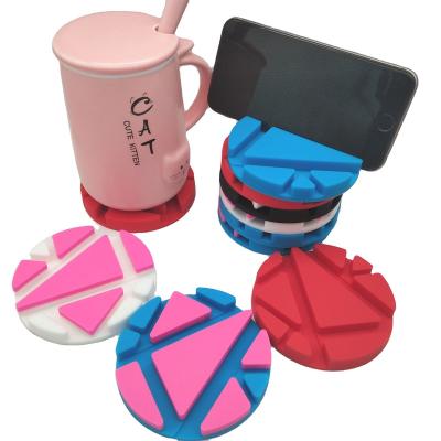 China Multifunctional Universal Cup Coaster PVC Universal Cup Holder/Cup Mat Silicone Cell Phone Desktop Holder for sale