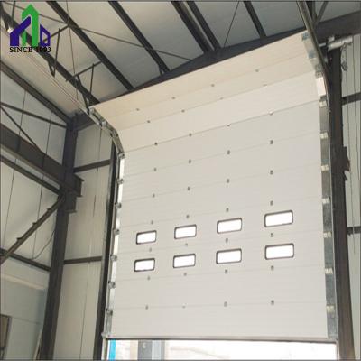 China JIANDA Automatic Modern Industrial Vertical Sliding Door Warehouse Sectional Industrial Doors for sale