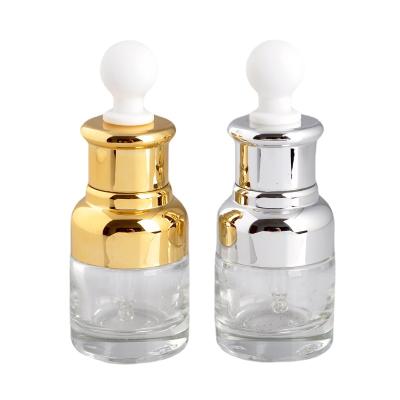 China Custom Personal Care 20ml 30ml 50ml Lotion Glass Bottle Empty Round Glass Essential Oil Dropper Bottle for sale