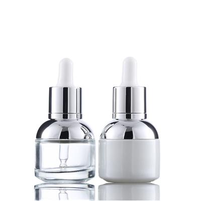 China Personal Care 30ml Clear Transparent White Glass Bottle Essential Oil Glass Bottle Empty Essence Bottle With Dropper for sale