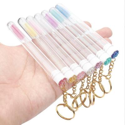 China Lash Extension Brush Keychain Disposable Eye Mascara Wands Lash Wand Keychain Mascara Magic Wands BASE mascara brushes in tube for sale