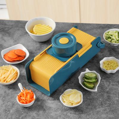 China Sustainable Kitchen Adjust Multi Food Shredder Cutter Vegetable Grater Mandoline Slicer 7 In 1 for sale