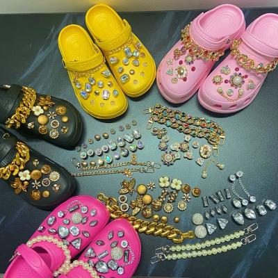 China 2021 New Autumn Winter Women Waterproof Mules Shoes Gold Bear Chain Slippers Clogs Bling Diamond Rhinestone Charms EVA Sandals Clogs Shoes for sale