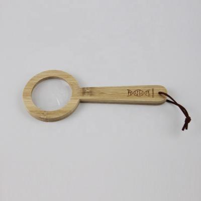 China Hot Selling Simple Operation Bamboo Handheld Magnifier Mini Magnification for sale