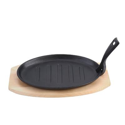 China Viable Hot Selling Cookware Dish Nonstick Cast Iron Frying Pan/Pan With Wooden Base Tary's Fry for sale