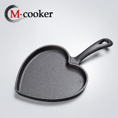 China Sustainable Cast Iron Heart Rack Casserole Egg Pan Cast Iron Breakfast Casserole for sale