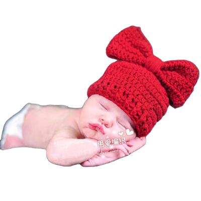 China Comfotable Made In China High Quality Custom Printed Baby Photography Props Bow Hats Winter Knitted Baby Hats Baby Photography Props for sale