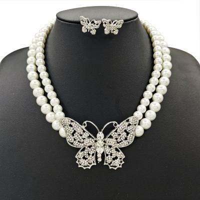 China 2021 Hot Sale Romantic Initial Double Layer Zinc Alloy Hand Beaded Crystal Butterfly Women Jewelry Necklace Earrings Mother's Day Set for sale