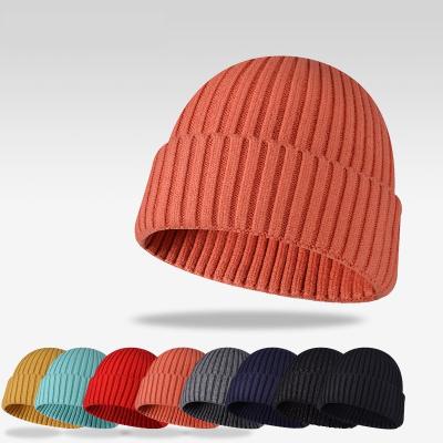 China Wholesale COMMON Logo Unisex High Quality Plain Custom White Dyed Solid Color Winter Hat Acrylic Knitted Slapped Beanie Hats for sale