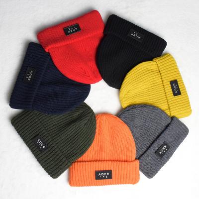 China Custom Embroidery COMMON Logo Rib Winter Kit Hats Outdoor Solid Color Warm Customize Beanies For Women And Men for sale