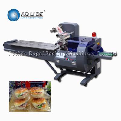 China Food Horizontal Flow wrapping Machine Cake Bread Packing Machine 3KW Power for sale