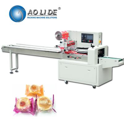 China Rotary Up Paper Bakery Packaging Equipment / Pillow Wrapping Machine for sale