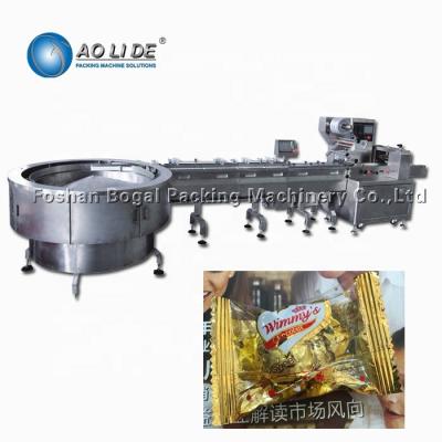 China Turntable Type Food Packaging Line Auto Feeding For Chocolate Round Bar for sale