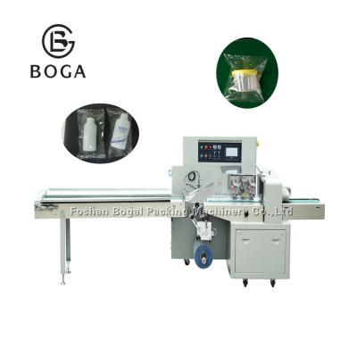 China Down Paper Type Pouch High Speed Flow Wrap Machine Empty Bottles Plastic Bag Packing for sale