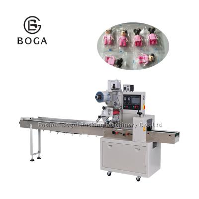 China Flow Wrap Packaging Machine Stationary Application Toys Packaging Engineer Provide for sale