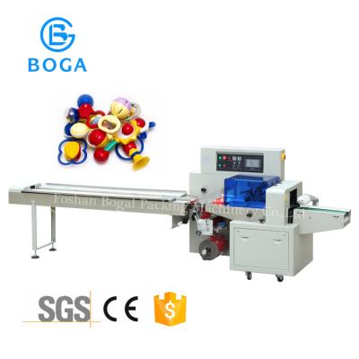 China Semi-automatic Small Plastic Toy Bag Packaging Machine Carbon Steel for sale