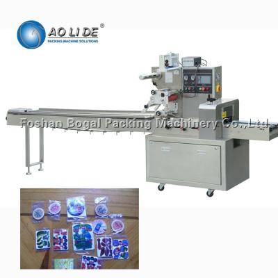 China Semi Automatic Mini Flow Wrap Machine Small Tablet Capsule Pill Blister Wrapping Sealing for sale