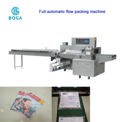 China High Speed Horizontal Flow Wrap Machine Multi Function Magazine Packaging for sale