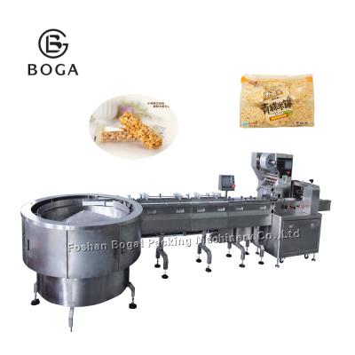 China High Speed Rotary Horizontal Flow Pack Machine Uncle Pop Feeding Crispy Rice Packing for sale