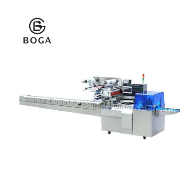 China Box Motion Pillow Packing Machine With Film Auto Splicer for sale