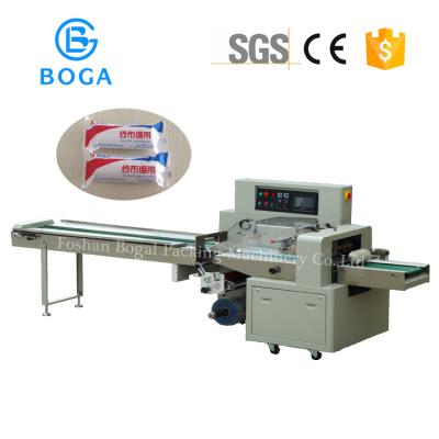 China Automatic High Speed Flow Wrapper Gauze Bandage Towel Roll Surgical Cotton Packaging machine for sale