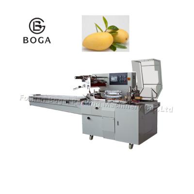 China Horizontal Box Motion Flow Wrapper / Fruits Tray Single Mango Packing Machine for sale