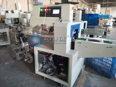 China Automatic 100 Pieces Plastic Hrizontal Flow Packing Machine for sale