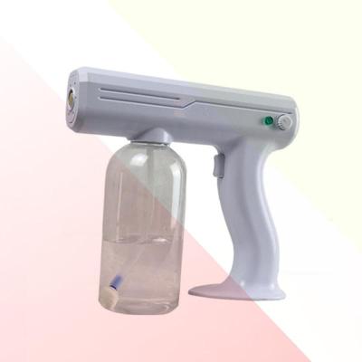 China Paint Spray Gun 800ML Portable Wireless Household Disinfection Gun Blue Light Nano Vapor Disinfection Gun for sale