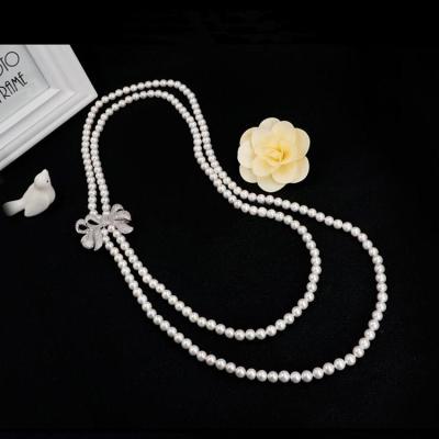 China Women White Shell Pearl Double Strands Sweater Necklace with Cubic Zirconia Bow Charm (SN702143BOW) for sale