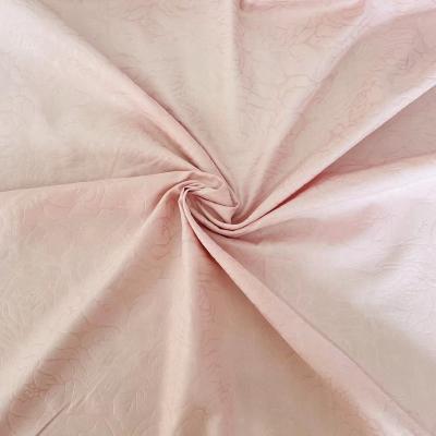 China Poly Sheet Flower Pattern Waterproof Cheap Cloth Embossed Microfiber Fabric for sale