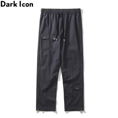 China Plus Size Pockets Ankle Zipper Mens Pants Elastic Waist Street Fashion Pants For Man for sale