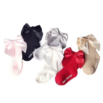 China 2022 New Trend Baby's Breathable Spring And Autumn Style Mid-Long Tube Children's Socks With Big Bow for sale