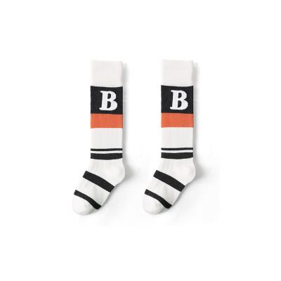 China Four Seasons Athletic Kids' Socks Cotton Socks Letter Tall Medium Length Sports Socks for sale