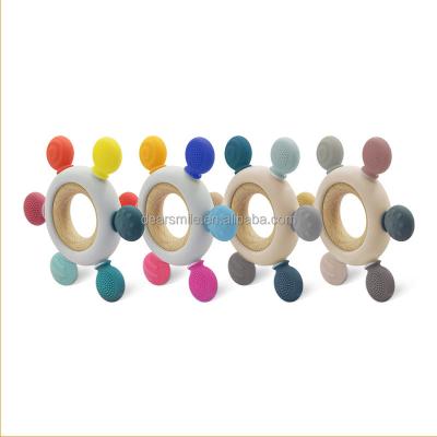 China Odorless& Non-toxic& Food Grade Silicone Heat Resistant Rudder Shape Colorful Baby Silicone Beech Wood Soft Teether Ring Teether for sale