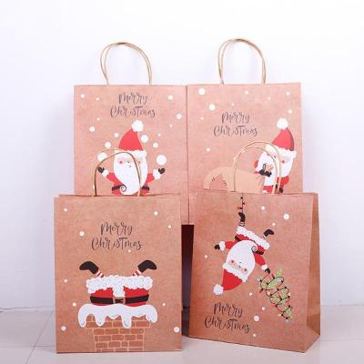 China Recycled Materials Festival Gift Bags With Handles Print Santa Claus Christmas Gift Bags For Cookie Packaging Bags Eco Friendly Christmas for sale