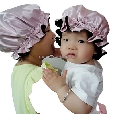 China Custom Logo Parents And Kids Eco-Friendly Double Layers Mom Reversible Baby Hair Braids Hoods Silk Sleep Hats for sale