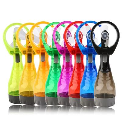 China Battery Powered Summer Outdoor Travel Hand Held Standing Mini Portable Water Mist Spray Bottle Cooling Fan with Water Tank for sale