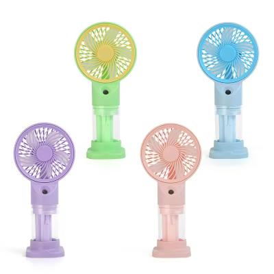 China New Summer Mini Handheld Fan Mute Portable USB Charging Spray Water Cooling Fan for Outdoor and Camping for sale