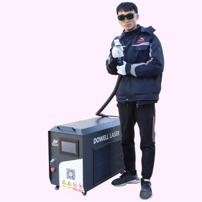 China Metal Surface Cleaning Industrial 1000 Watt Handheld Rust Paint Removal Application Fiber Laser Cleaning Machine for sale