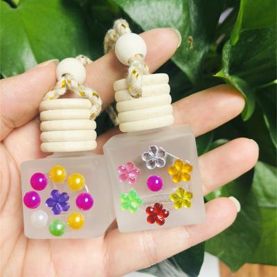 China Cosmetic the most popular mini hanging empty car diffuser bottles car perfume bottles glass perfume essential oil bottle for wholesales for sale