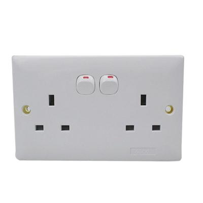 China Plastic+Copper Parts Switch 2x13a Socket Outlet Floor Socket English Standard Multifunctional UK Standard Wall Sockets Switches for sale