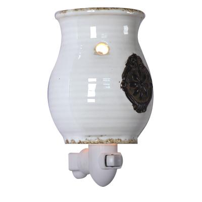 China Wholesale Type Ceramic Wax Candle Heater / Oil Burner Electricity Plug Aroma Burner Heater for sale