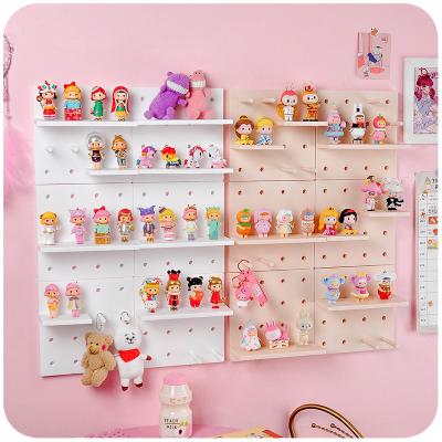 China Bedroom Free Separation Kitchen Living Room Storage Dish Hole Children's Storage Racks Multi-Layer Punching Wall Storage Rack for sale