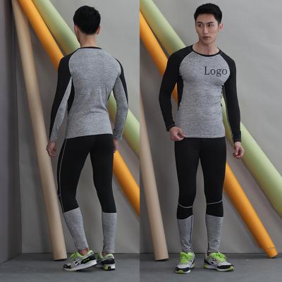 China Breathable Wholesale Low Moq Compression Set Fitness Running Gym Suit Active Wear For Men Two Piece for sale