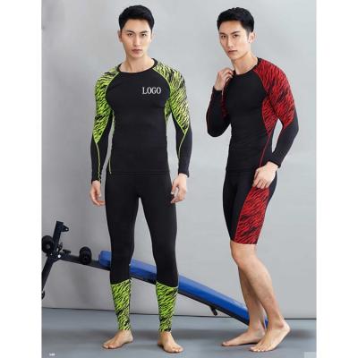 China Wholesale Tight Breathable Mens Premium Sports Wear Spandex Gym Wear Mens Fitness Clothing à venda