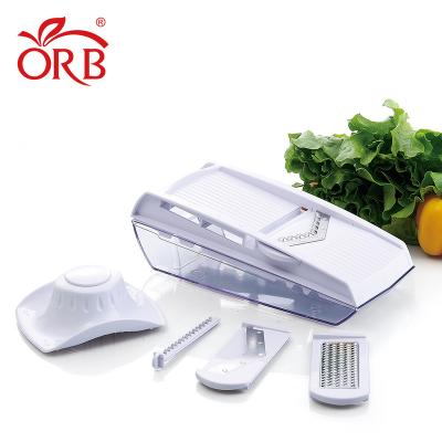 China 4 Blade Multi Viable Fruit Kitchen Free Sample Vegetable Peeler Grater Slicer Cutter Vegetable Cleaver With Container for sale