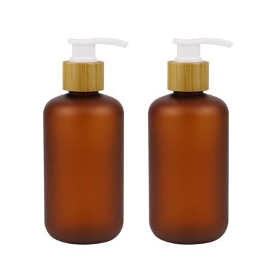 China Personal Care Essential Oil Hand Wash Shampoo 200ml 250ml 300ml 500ml PET Bottles With Bamboo Pump Head for sale