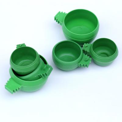 China Farms Parrot Cup Feeder Bird Feeder Bowl Plastic Pet Feeding Bowl For Sale for sale